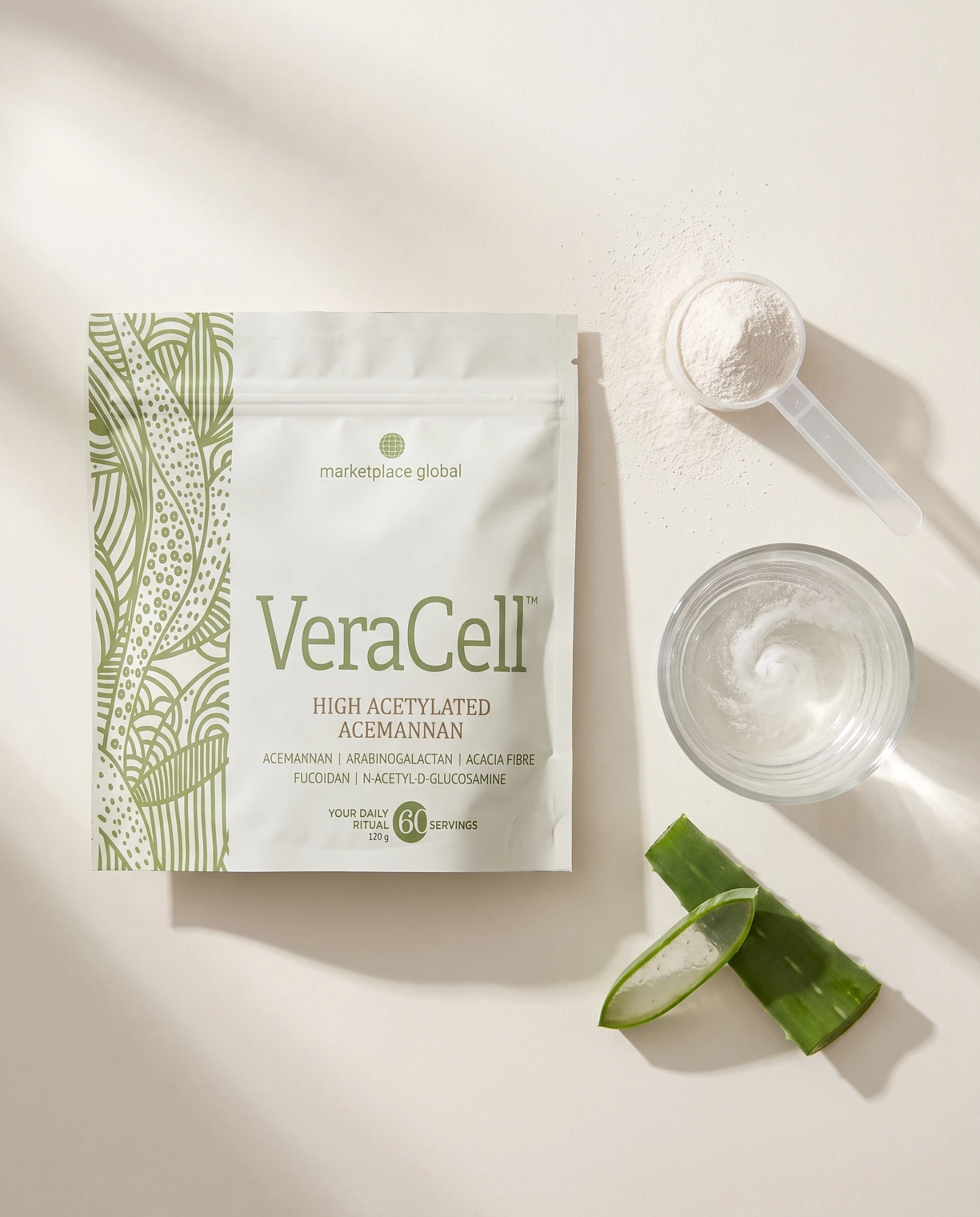 The morning ritual: VeraCell powder, a glass of water and a journal on a linen cloth